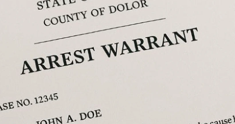 An official legal document with the bold header text "ARREST WARRANT" centered on the page.